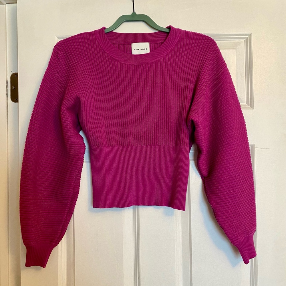 Pink Rose small, ribbed, fitted sweater with loose sleeve detail.